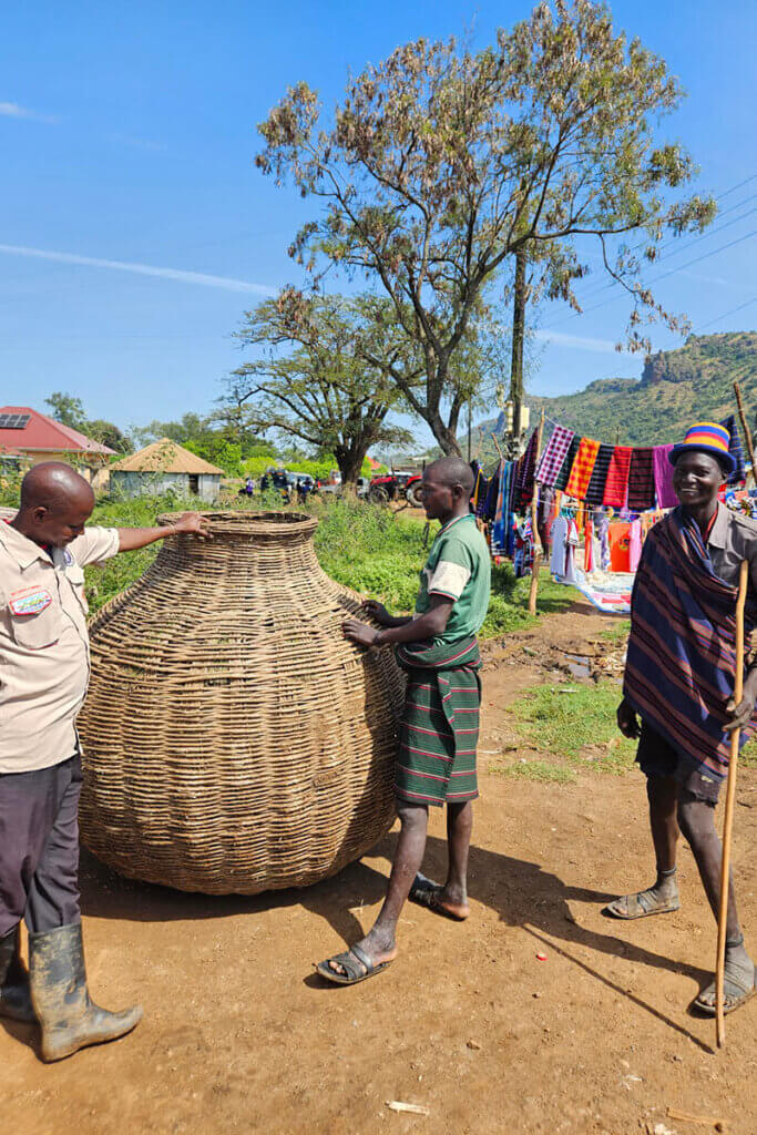 local knowledge when travelling with a local guide in Uganda, visiting a local market in Karamoja