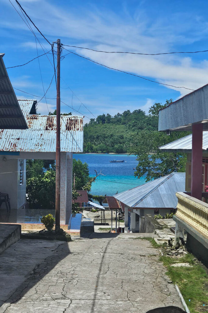 The streets of Saparua Island and the houses, with the sea at the end of the street