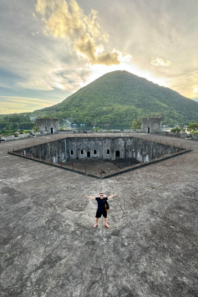 Jan Boelo posing at Fort Belgica on Banda Neira of the Moluccas Indonesia