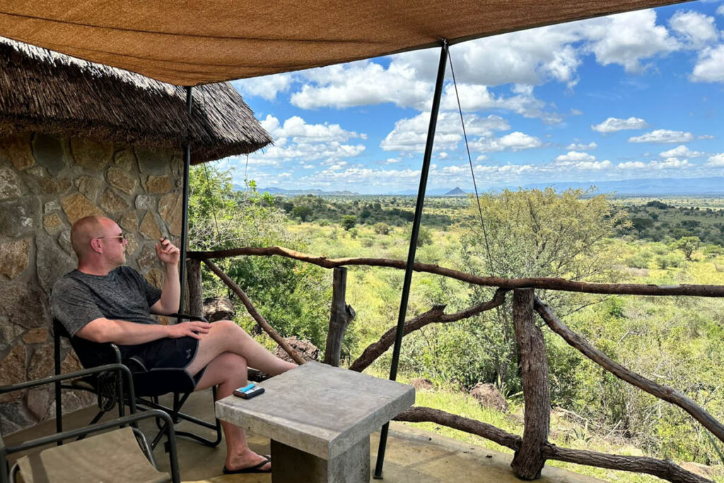 Jan Boelo at the Kidepo Savanna Lodge in Karamoja Ugana enjoying the view and landscape