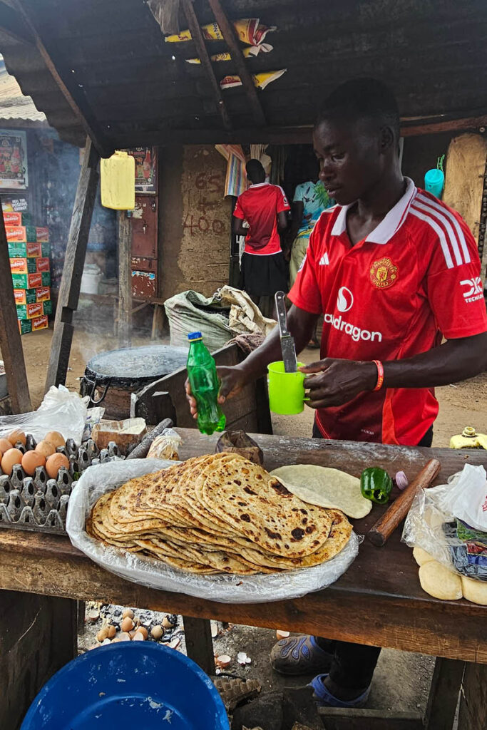 Local rolex stand in Namalu Karamoja Uganda is offering rolled eggs