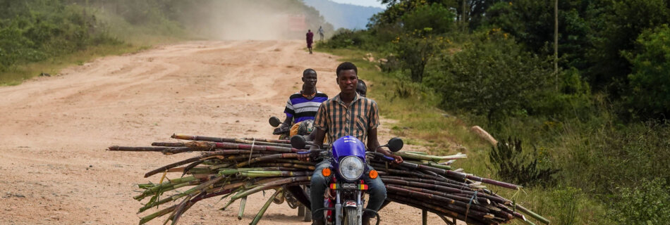 how to travel to karamoja uganda boda boda passing by
