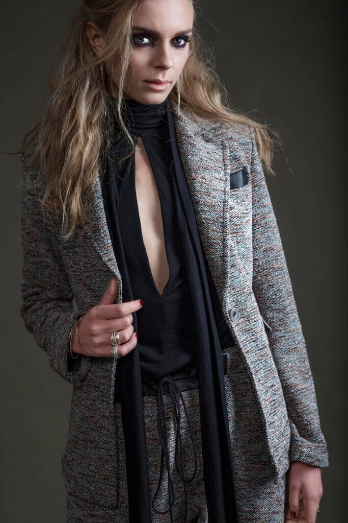 JANBOELO model in stylish tailored outfit.