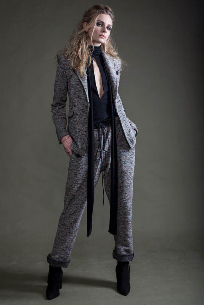 JANBOELO model in stylish tailored outfit.