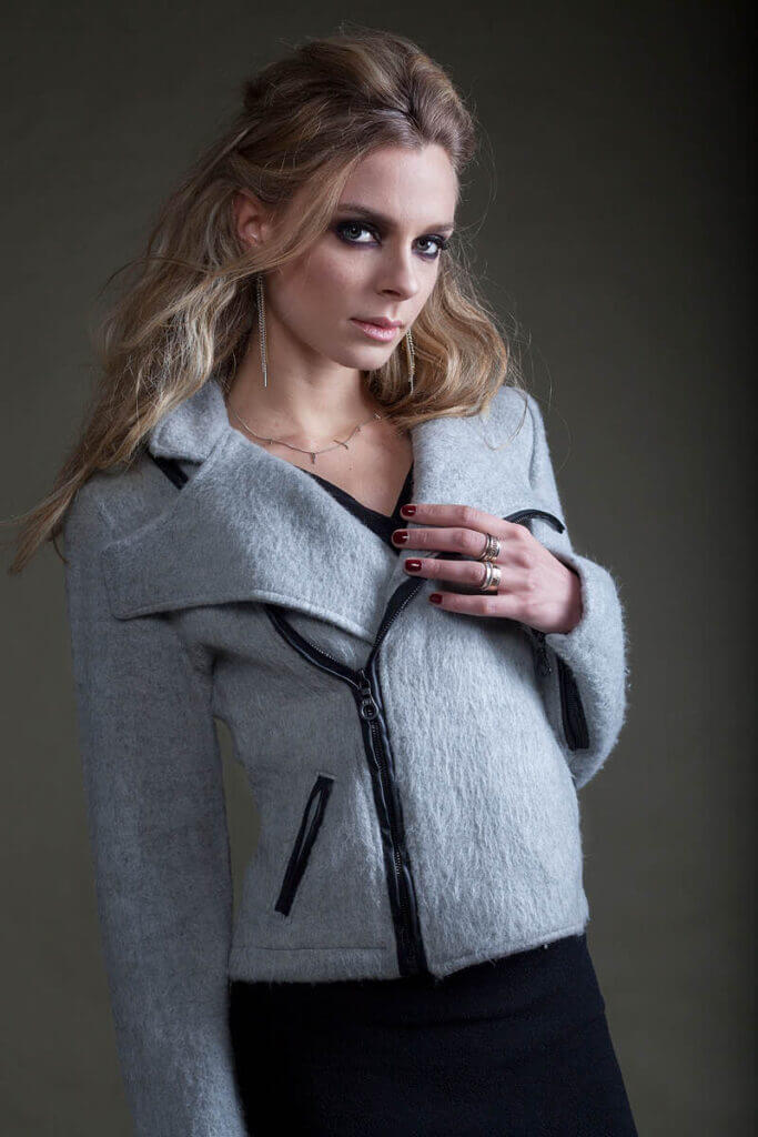 JANBOELO Model in stylish grey jacket.