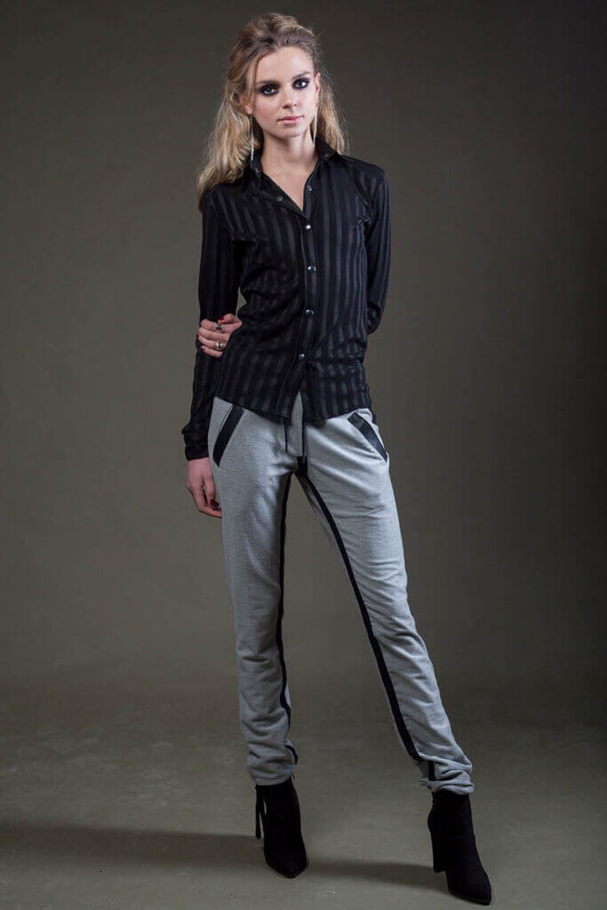 JANBOELO Model in stylish black and grey outfit.