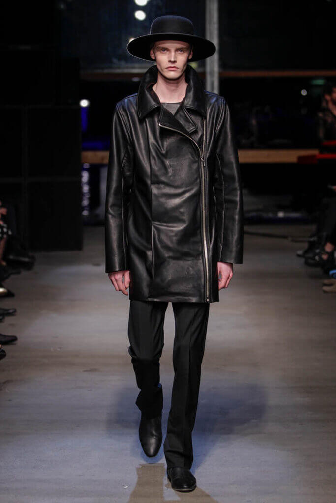 JANBOELO show Fall Winter 2013 2014 collection Model in black leather coat walking