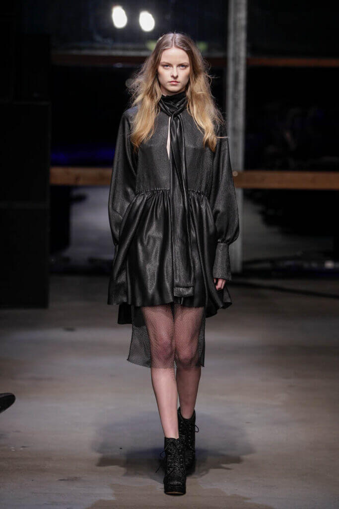 JANBOELO show Fall Winter 2013 2014 collection Model in black dress on runway