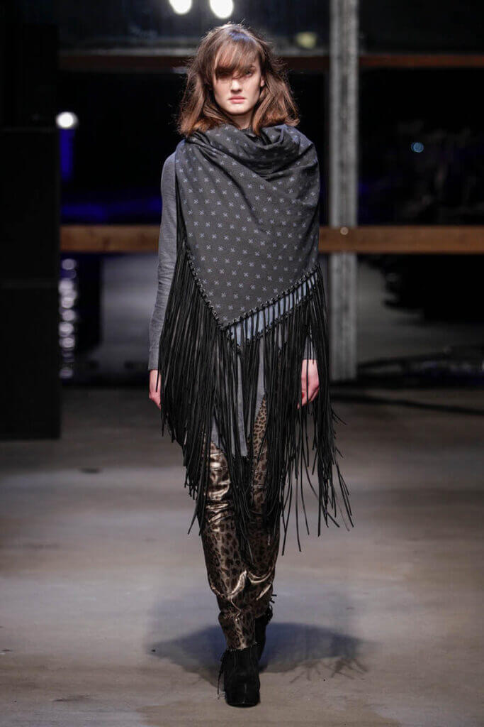 JANBOELO Fall Winter 2013 2014 collection model showing scarf with leather fringes