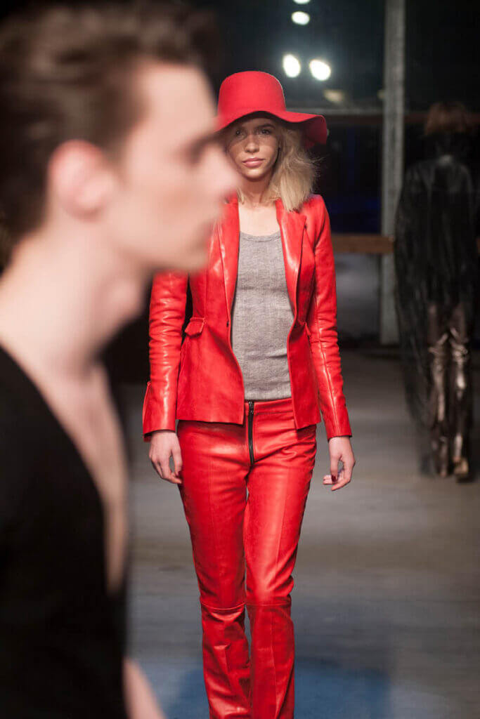 JANBOELO show Fall Winter 2013 2014 collection Model in striking red outfit walking