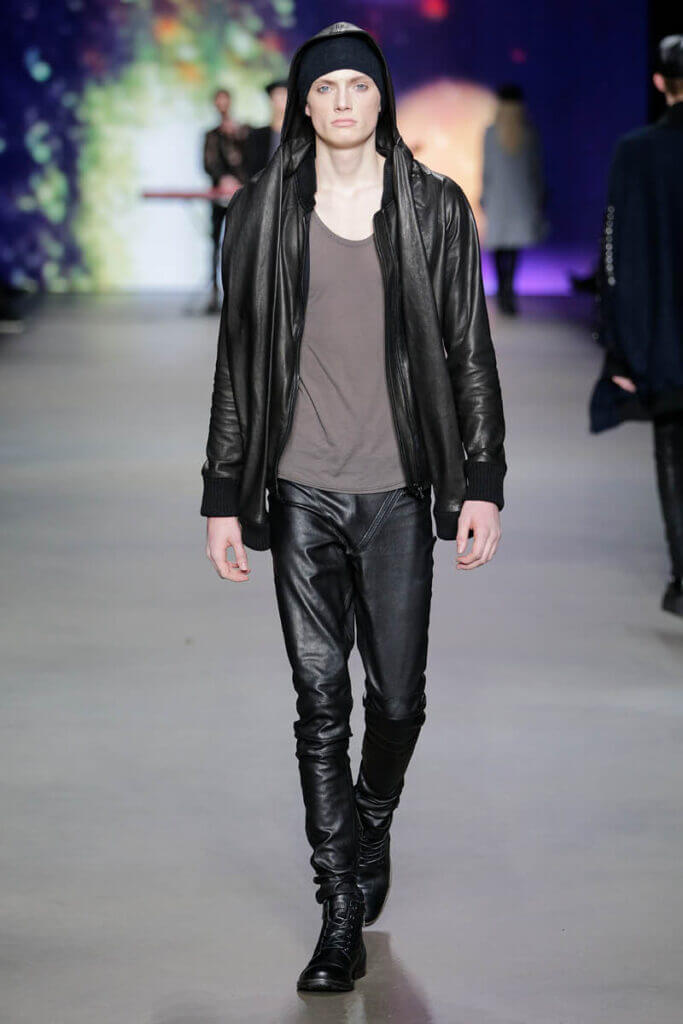 JANBOELO fall winter 2014 collection show look 18, Model in stylish leather outfit walking