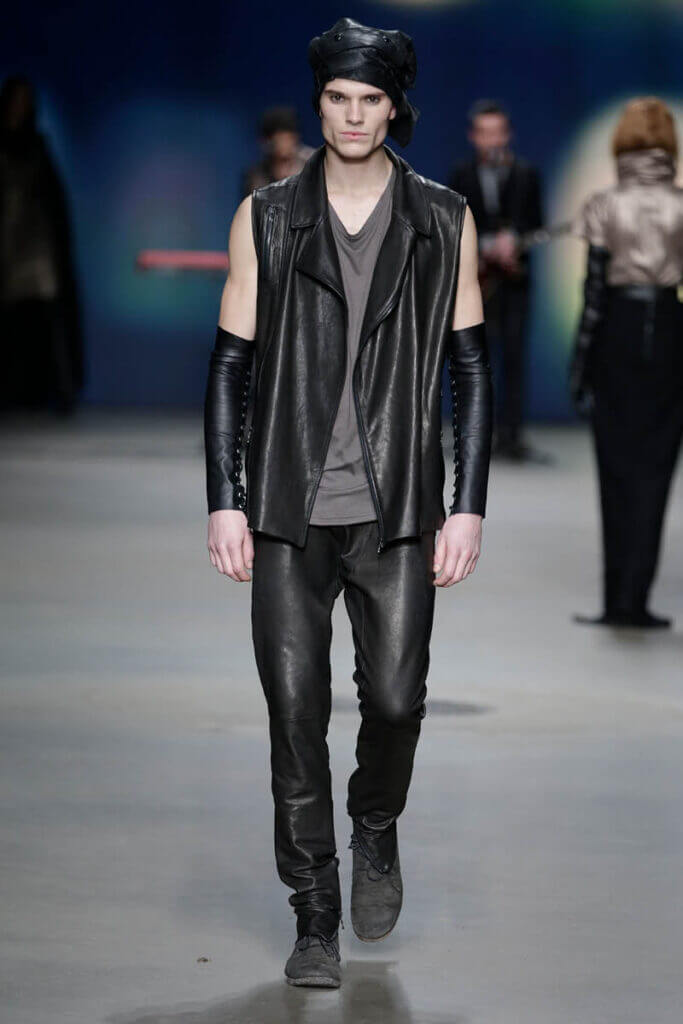 JANBOELO fall winter 2014 collection show look 6, Model in edgy leather outfit walking