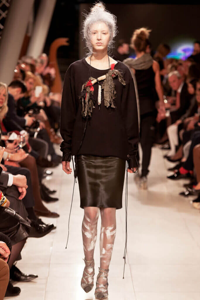 JANBOELO Fashion Show fall winter 2016 look 15, model in leather shirt with sweater