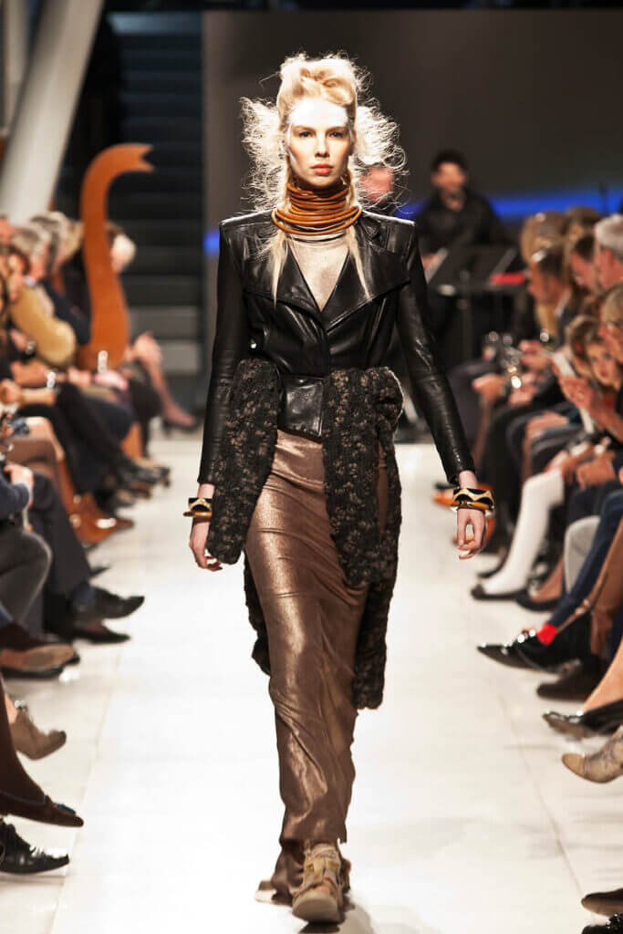 JANBOELO Fashion Show fall winter 2016 look 2, model with gold leather dress and black leather jacket