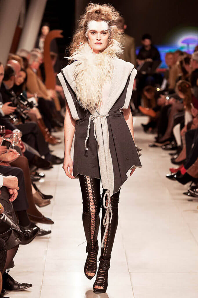 JANBOELO Fashion Show fall winter 2016 look 20, model in leather trousers and grey with white cardigan