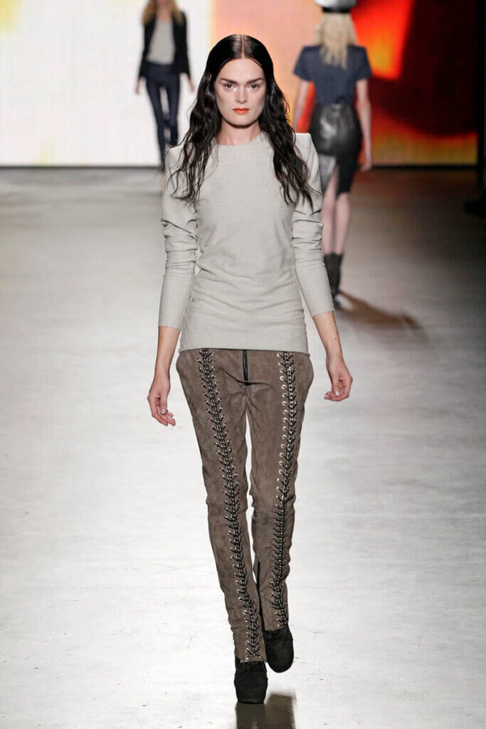 JANBOELO show Spring Summer 2013 collection Model walking in stylish beige outfit.