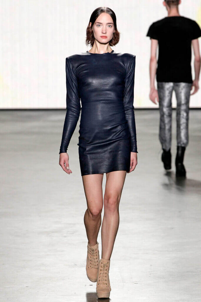 JANBOELO show Spring Summer 2013 collection Model in sleek navy leather dress walking