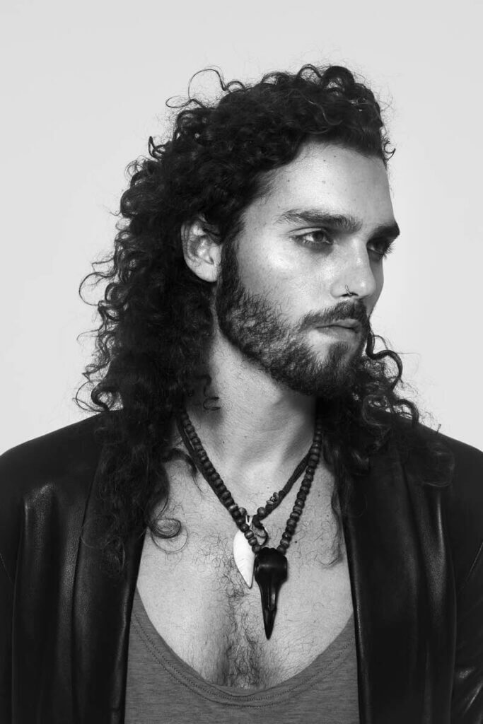 JANBOELO lookbook shot by Robin de Puy for spring summer collection portrait 4, model with curly hair and necklace