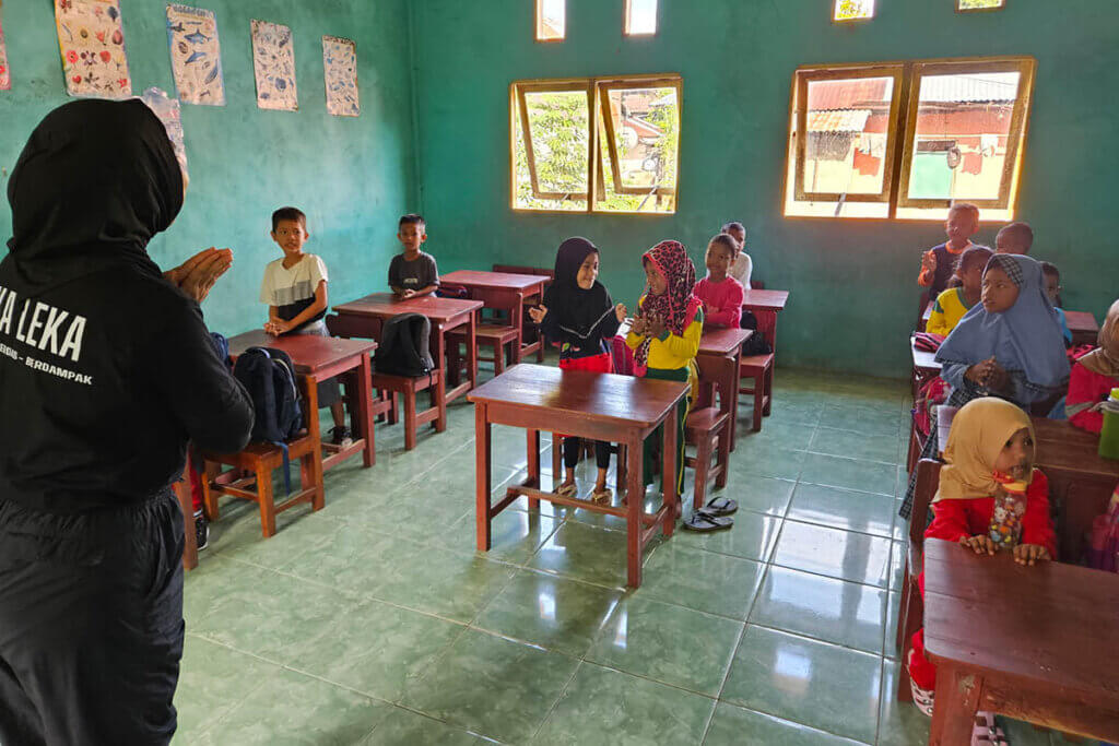 A classroom with children and a teacher of Heka Leka showcasing education in the Moluccas Indonesia