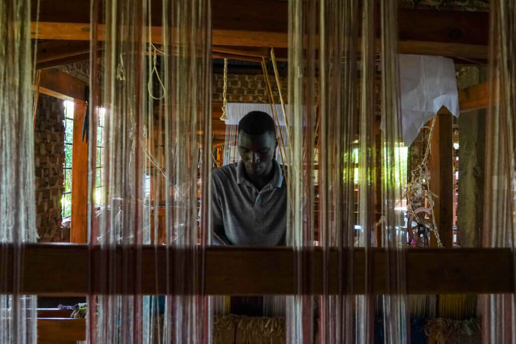 Textile weaving in Uganda inside a weaving workshop in Jinja