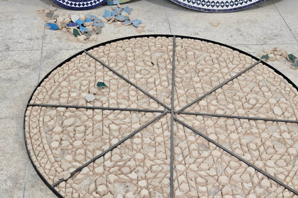 Handmade geometric mosaic pattern assembled in Fez