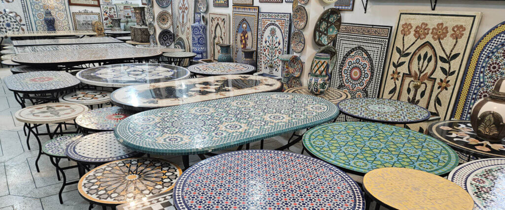 Mosaic tables in a local workshop in Fez Morocco