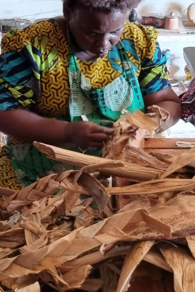 Traditional artisan workshop where handmade objects are created from banana leafs